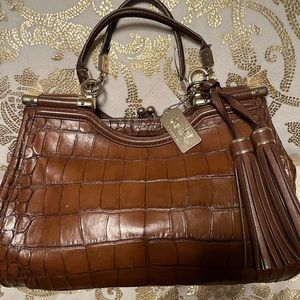 Brown leather Coach bag.